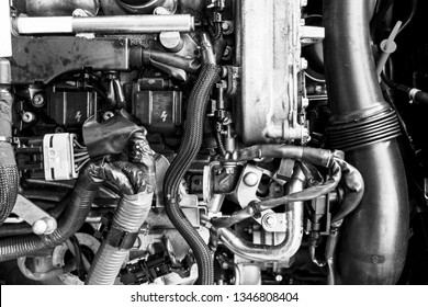 Car Gasoline Engine. Car Engine Part. Close-up Image Of An Internal Combustion Engine. Engine Detailing In A New Car. Black And White. Top View