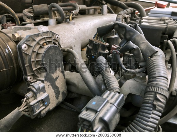 Car
gasoline engine photo. Car engine parts. Close-up image, internal
combustion engine, used car, natural light,
color.