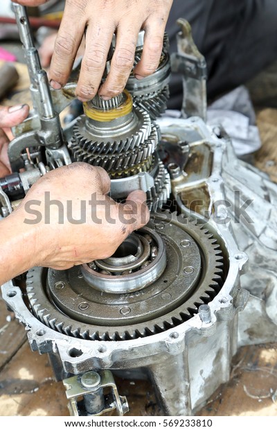 Car Gear Box Repair automotive repair workshop garage\
mechanic \
