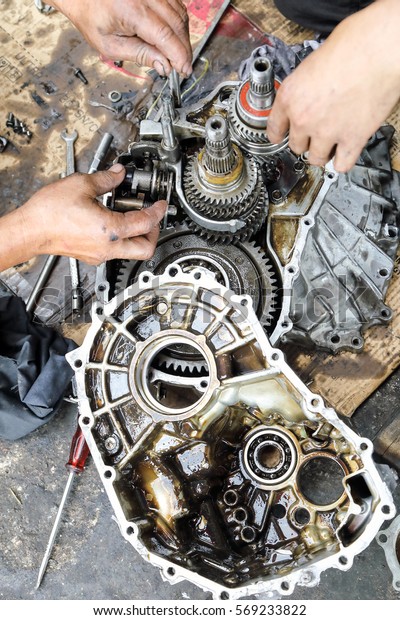 Car Gear Box Repair automotive repair workshop garage
mechanic 
