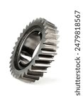 A car gearbox gear, a track transmission gear, a mechanism gear with a beveled engagement tooth. White background, selective focus, close-up