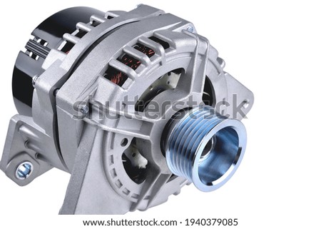 car generator, car electrical network element on white background, generator details close-up selective focus