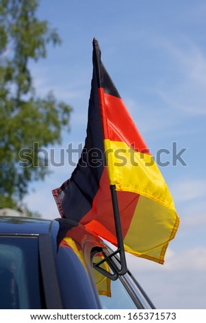 Similar – German flags on the roof of a soccer fan’s car