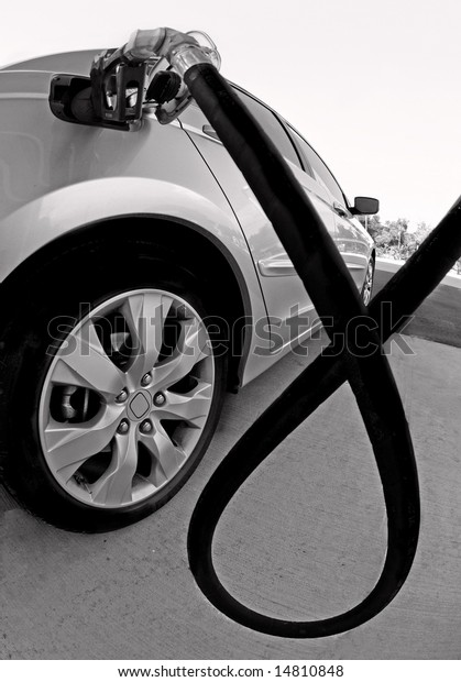Car getting fuel at gas\
station
