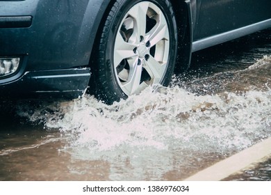 Car Goes Through Puddle Puddles On Stock Photo 1386976034 | Shutterstock