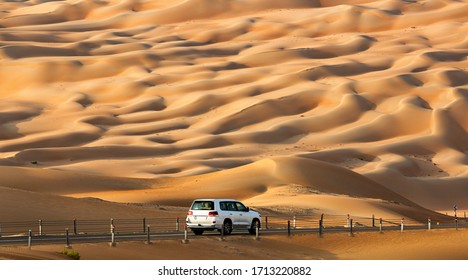 A Car Going On Road In Deserts Of LIWA Abu Dhabi UAE