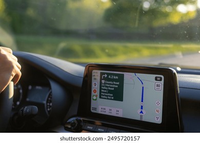 Car GPS Navigation System in Action - Powered by Shutterstock