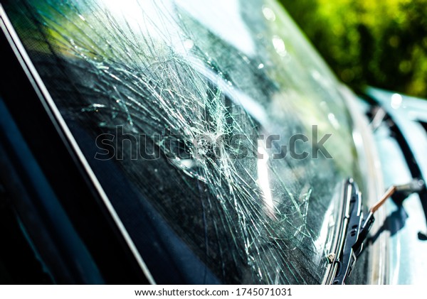 The car had an\
accident. broken glass.\
cracks