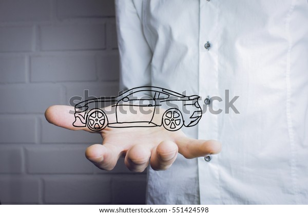 car in the hands of\
the business concept