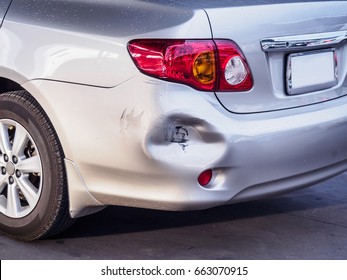 car has dented rear bumper damaged after accident