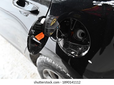 The Car Has An Open Gas Tank. 
Fuel Tank Cap.
The Inscription On The Lid Of The Tank In Russian: Attention, Open Slowly, Close Tightly