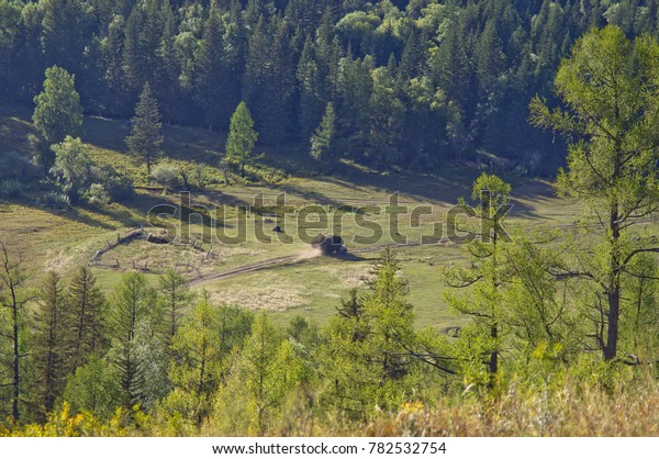 Car with hay rides around sun valley in the\
summer in the Altai\
mountains.