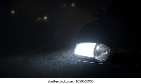 Car Head Lights In The Night