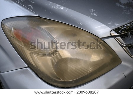 Car headlamp that look dull stock photo.