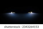 Car headlight blinking in Dark. Sports car Headlight. Switching of car LED headlights in night