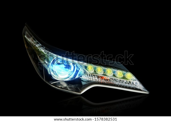 Car headlight, circular car\
technology Isolated from the white background clipping\
part