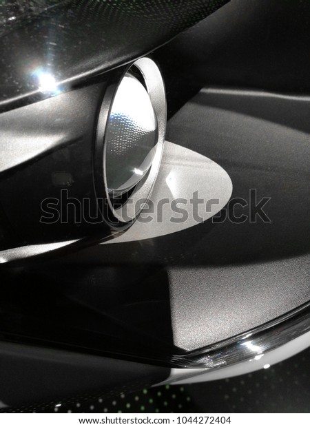 Car
headlight. Close-up side view of automobile part.
