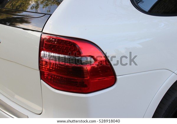 Car\
headlight close-up. Turn, stop and reverse\
signals.