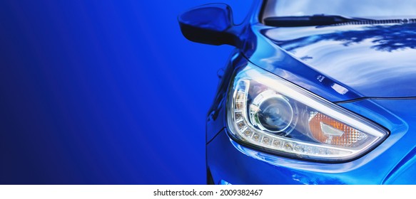 Car headlight. Lamp of modern car headlight. Close up view with copy space. - Shutterstock ID 2009382467