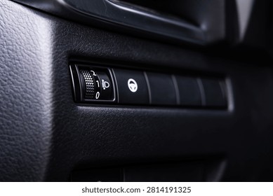 Car Headlight Level Adjustment Switch On Dashboard Interior Close Up For Automotive Controls And Safety