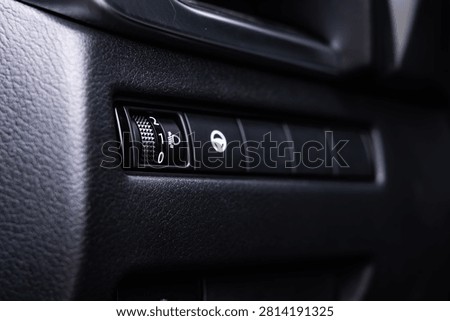 Car Headlight Level Adjustment Switch On Dashboard Interior Close Up For Automotive Controls And Safety