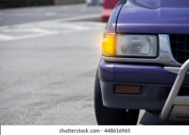 Car Headlight. Car Open Turn Light On Freeway.