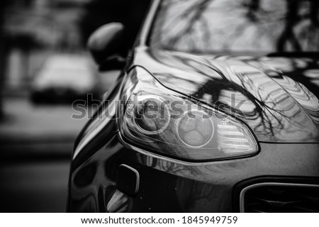 Car headlights. Exterior closeup detail. Car detail