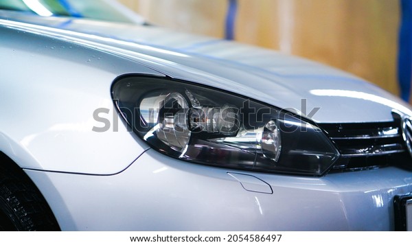 Car\
headlights. Exterior closeup detail. Car\
detail