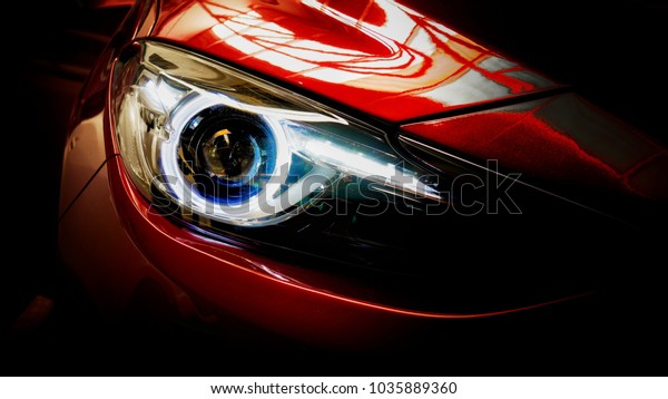 Car
headlights. Exterior detail. Car luxury
concept

