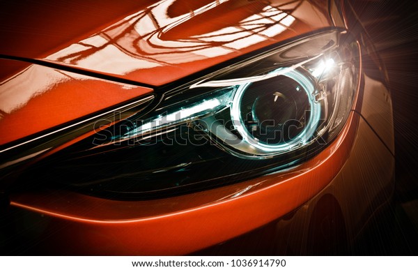 Car\
headlights. Exterior detail. Car luxury\
concept