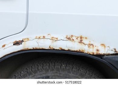 Car With A Hole From Rust And Corrosion
