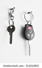 Car And House Keys Hanging On Wall