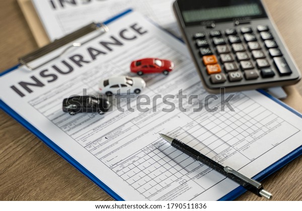 car incident protective and car insurance\
policy examining insurance