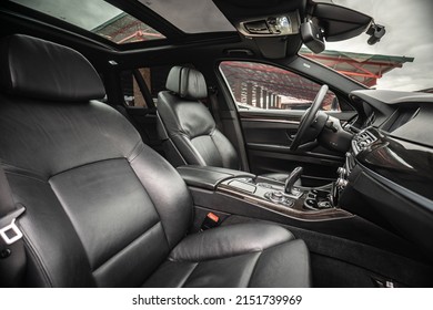 Car Inside. Interior Prestige Modern Car. Comfortable Leather Seats. Black Cockpit With On Isolated White Background.