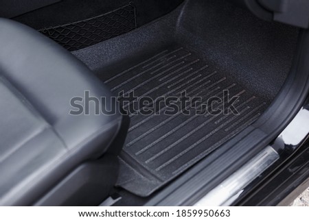 Car inside, passenger foot mat