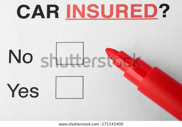 Car\
insurance concept. Felt pen on question\
form
