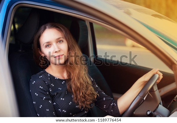 Car insurance driver. Pretty girl. Beauty lady\
inside. Drive school.
