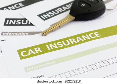 Car insurance form with car key - Shutterstock ID 282272219