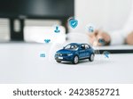 Car insurance, vehicle protection concept. Protect blue toy car under a glass dome with icon car care, insurance, and repair coverage covered automobile for financial security.