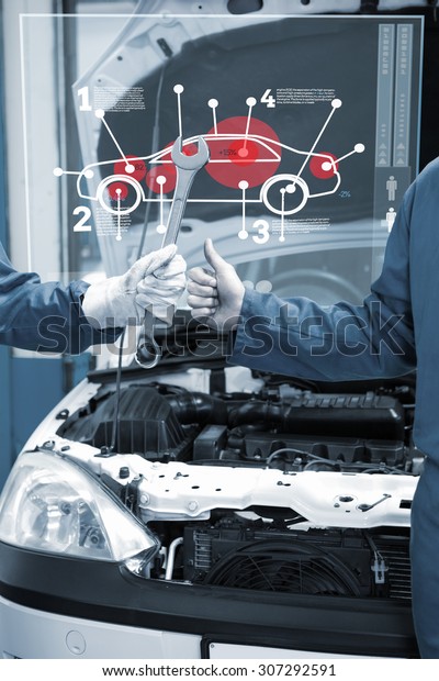 Car\
interface against team of mechanics working\
together