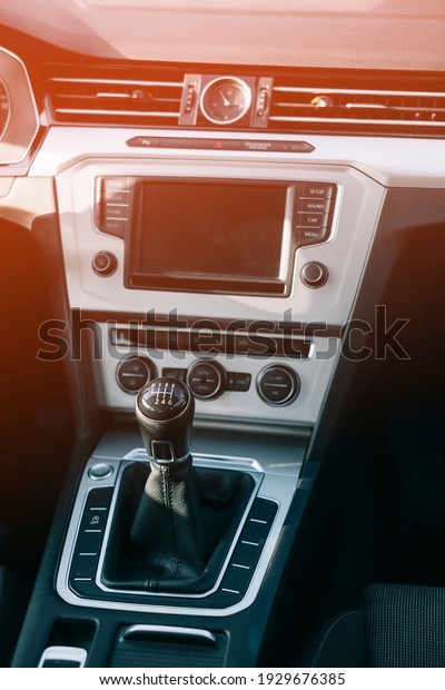 Car interior, black interior\
combined, aluminum, leather steering wheel, manual\
transmission.