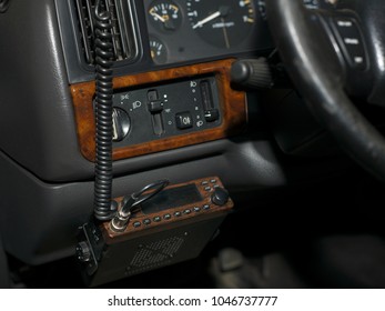 Car Interior With CB Radio Under A Dashboard