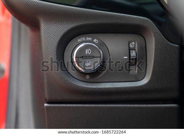 car interior\
close up of light control in\
car