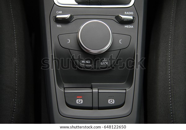 car interior, control panel of driving auxiliary\
functions in modern car