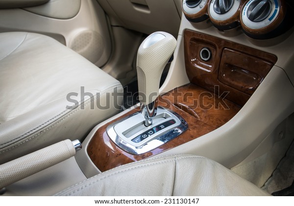Car interior decorate wood. Automatic transmission\
gear shift.