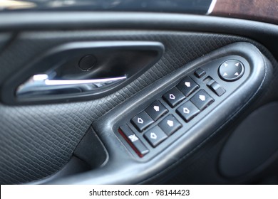 Car Interior Detail. Closeup Of Controls On The Door