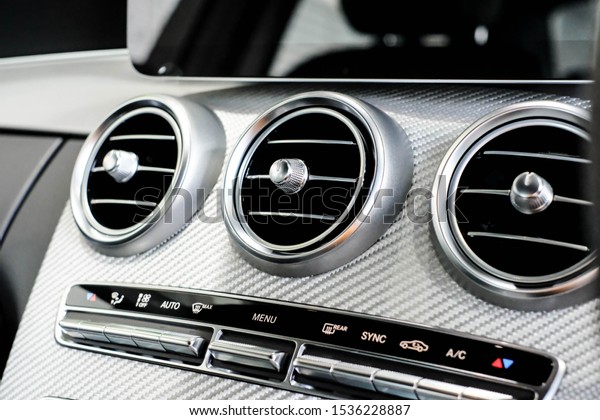 Car Interior Detail, Luxury Car Air and Control\
Buttons, Silver Kevlar.