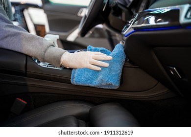 Car Interior Detailing Male Hand In Glove With Cleaning Cloth