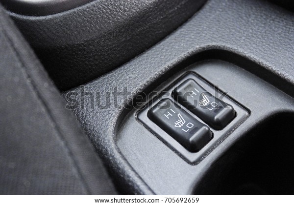 Car interior\
details. Seat heating\
buttons