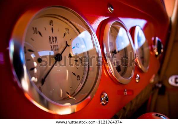 Car\
interior with focal point of glossy\
speedometer
